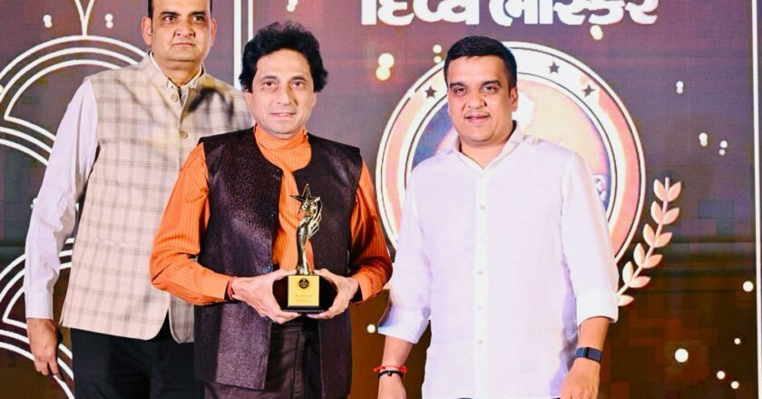 Writer and poet Dipak Desai received the Gujarat Excellence Award from Gujarat Home Minister Harsh Sanghavi